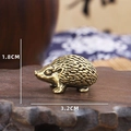 Handcrafted vintage brass hedgehog tea pet figurine on a wooden tray measuring 3.2cm x 1.8cm - Hedgehog / Bronze