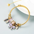Adjustable gold-plated beaded bracelet with purple crystals and butterfly charm - Purple