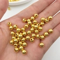 Polished gold round CCB beads on palm for DIY jewelry making and handmade crafts - Gold Beads (14081)