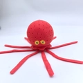 Red silicone octopus squeeze toy for water play featuring yellow eyes and a cute shape - Red Bath Octopus
