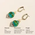 Orecchini pendenti vintage con perla bianca e perle in vetro blu fatte a mano - Orecchini / Orecchini Coda di Fenice Blu
