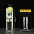 Tall 280ml highball glass for mojitos with clear lime and ice detail on black backdrop - Style 35 Juice Glass