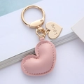 Pink faux leather heart keychain with golden metal ring and Love charm for bags - Pink