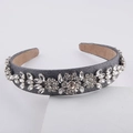 Detail of baroque headband with sparkling crystals on grey background in 45-degree view - Shiny Silver