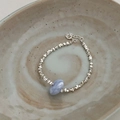 Irregular natural pearl and silver beaded bracelet with a central light blue marble bead - Light Blue Textured Beaded (SL0783)