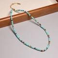Minimalist turquoise beaded necklace with gold lobster clasp and extension chain - XL00100 Turquoise Tone Mixed Color