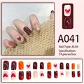 Press-on nail set A041 in dark red, orange and pink with golden glitter and heart patterns - A041 Brown Heart (A041)