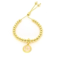 Détail du bracelet à billes dorées avec pendentif lettre L en émail rose et cordon - Lettre L