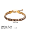 Golden 18K gold-plated stainless steel woven bracelet with black and white zircon inlay - Black and White Zirconia Style (NB-B1130-7)