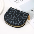 Black semi-circle patterned coin purse with blue motifs and golden zipper closure - Black (Anchor Print)