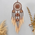 Acchiappasogni boho con anelli marrone scuro, perle di legno e lunghe frange gialle - Marrone