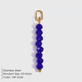 Verticale hanger met acht donkerblauwe gefacetteerde kralen en 14K goud roestvrij staal - September Koningsblauw (Saffier Kleur)