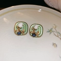Detailed close-up of vintage green square earrings with white floral and gold patterns - Green Square Flower (S925 Silver Pin)