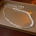 Irregular silver beads and white pearl necklace with asymmetrical design on gold tray - Silver Tassel Crushed Silver Necklace - Type 2