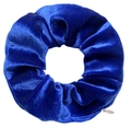 Close-up detail of a soft blue velvet scrunchie with rich texture and elastic folds - Sapphire Blue