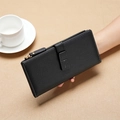 Long leather wallet for women in elegant black finish with zipper and snap strap details - Black