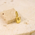 Minimalist gold stainless steel necklace featuring a polished letter D initial pendant - Letter-D / Gold