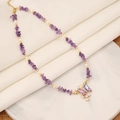 Handmade beaded necklace with natural purple stones and a sparkling butterfly pendant - Purple