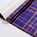 Dark blue gift wrapping paper with metallic gold lattice pattern in a premium roll - Blue and Gold Plaid