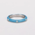 Macro detail of a light blue enamel ring band with sparkling inset zircon stones - Sky Blue