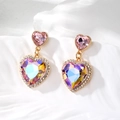 Detail of aurora crystal heart earrings with pink stones and pavé cubic zirconia - Light Purple Heart