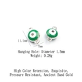 Detail view of green evil eye alloy pendants showing dimensions 11.1mm height and 7mm width - Silver - Green Evil Eye