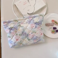 Detailed macro view of quilted floral cotton makeup bag with elegant rose pattern - Oil Painting Pink Purple Floral