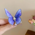 Detail of butterfly hair clip with purple acrylic wings, crystal center and pearl drop - Butterfly Duckbill Clip / Purple