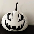 Macro shot of white fabric Halloween pumpkin with black face and subtle glitter texture - 7cm / Black Expression