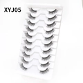 Detailed view of 10 pairs of black cat eye eyelashes in white tray model XYJ05 - Curled Voluminous Style (XYJ05) / 10 Pairs Set