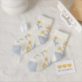 Soft white coral fleece socks for women featuring yellow flower patterns and blue details - Yellow Flower