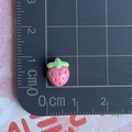 Detailed view of mini resin strawberry charm on measuring mat showing 1cm size - Super Mini Deep Pink Strawberry / 1 Piece / Deep Pink