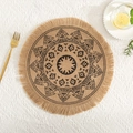 Macro shot of circular jute placemat featuring black geometric patterns and fringe detail - Natural Jute Tassel Black Pattern 1