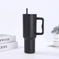 Matte black 40oz stainless steel tumbler with handle and straw in a modern setting - 40oz / Black