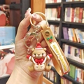 Brown Christmas bear keychain with Merry Christmas silicone strap and gold ring - Bear (Gold Keychain)
