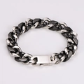 Detailansicht des zweifarbigen Hip-Hop-Cuban-Armbands in Silber und Gunmetal-Schwarz - Armband / Stahlschwarz