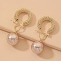 Orecchini a cerchio intrecciati dorati con perle champagne stile vintage - Orecchini di perle dorate