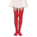 Detail of red Christmas over-the-knee socks with cute plush reindeer and bow ornaments - Red Socks with Reindeer Face Doll