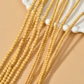 Macro view of 3/4mm yellow turquoise round loose beads for DIY jewelry making - Yellow