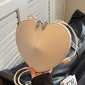 Chic heart-shaped crossbody bag in creamy white leather with dual zipper closure - Off-white