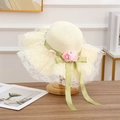 Cream straw sun hat featuring elegant white lace, pink rose, and light green bow detail - Paper Straw Green Ribbon - Creamy White