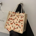Piccola borsa tote in tela con stampa floreale arancione e manico in corda intrecciata - Arancione