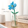 Blue building block flower bouquet in a glass vase on a wooden table display - Datura 260-31 / Bag Packaging