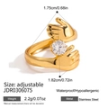 Detail of adjustable golden hugging hands ring with white cubic zirconia in stainless steel - Gold Hugging Hands Heart Zirconia Style (JDR0306075)