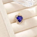 Exquisite gold-plated heart pendant featuring a deep blue gemstone and white rhinestones - Royal Blue Pendant