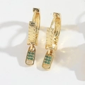 Elegant gold zipper pull earrings with green zircon stones on white background - Gold with Green Zirconia