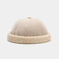 Detail of cream docker hat showing corduroy crown and plush faux fleece texture - Adjustable / Beige
