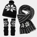Detail of black and white snowflake knitted set including scarf, hat, and fingerless gloves - Black