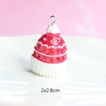 Detail of Christmas resin pendant featuring red and white cupcake hat design with glitter - Style 30-Red and White Knit Hat