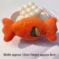 Detail of candy-shaped plush pet toy with Sugar embroidery and cute avocado patterns - Orange (Sugar + Avocado Embroidery)